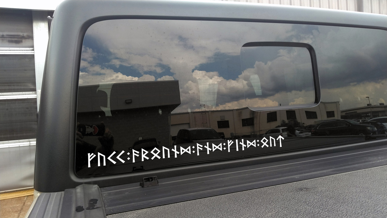 FAFO written out in Futhark runes vinyl sticker decal applied to Jeep truck hood side with bold angular rune lettering