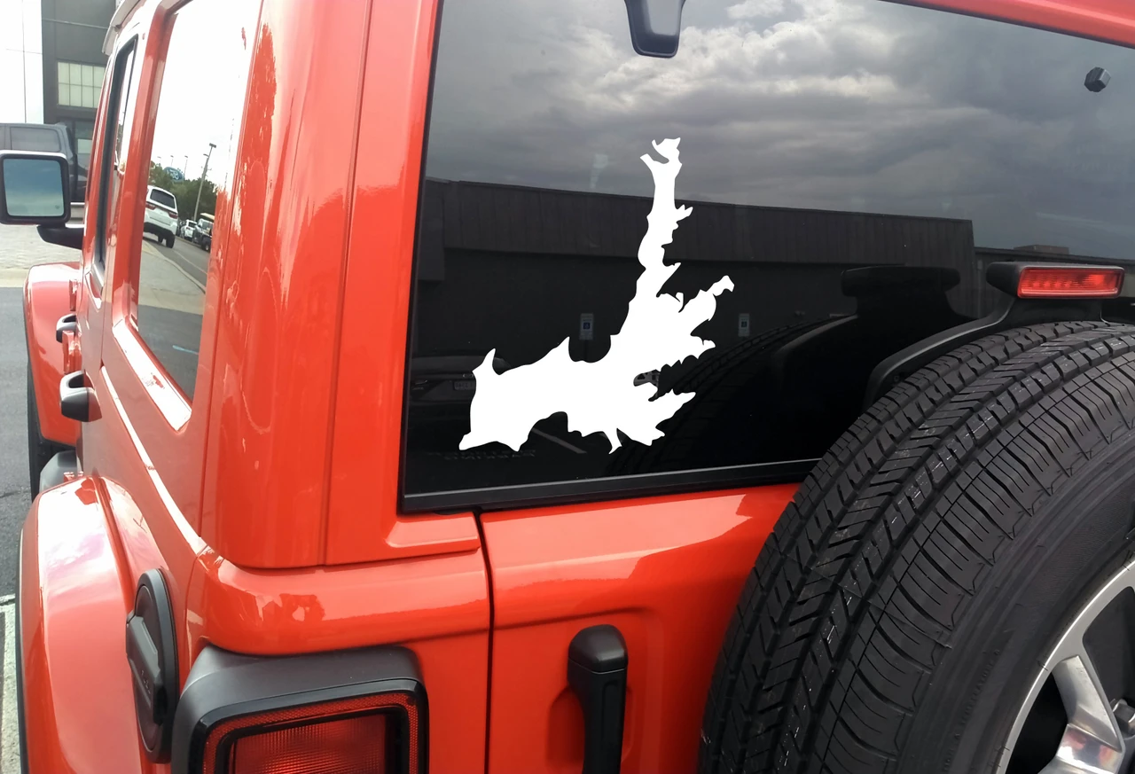 Hayden Lake outline vinyl sticker decal showing Idaho lake map shape applied to car window in minimalist design