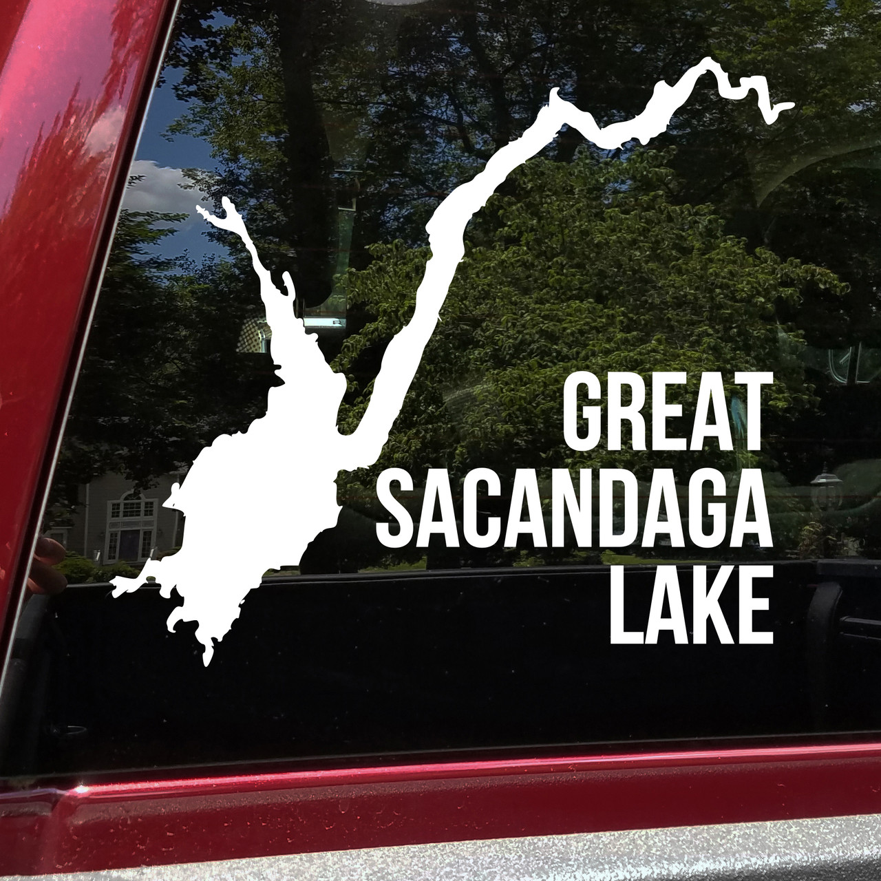 Great Sacandaga Lake outline vinyl sticker decal applied to car window showing Adirondack New York map shape with text placement