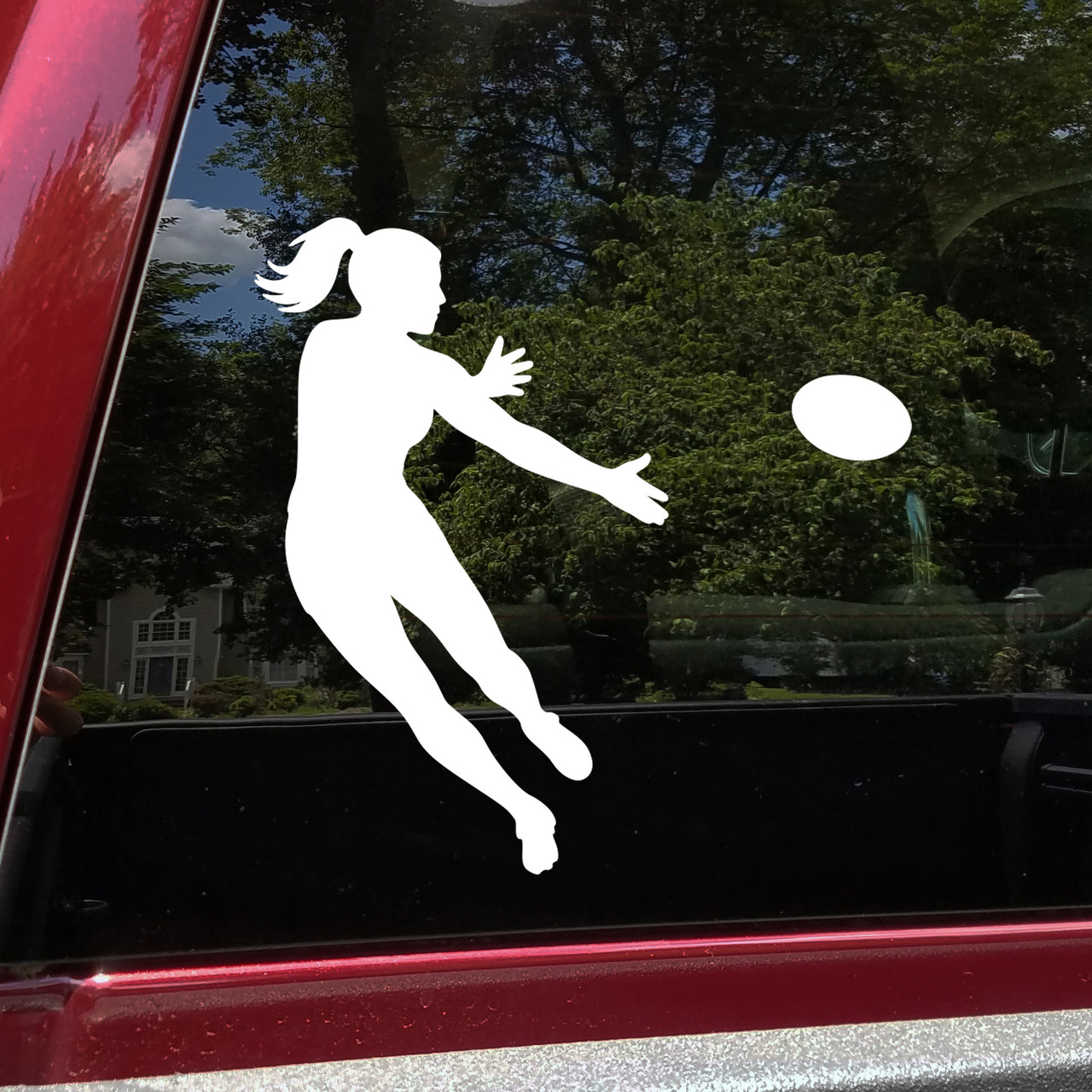 female rugby player silhouette vinyl sticker decal applied to car window showing athletic sports design