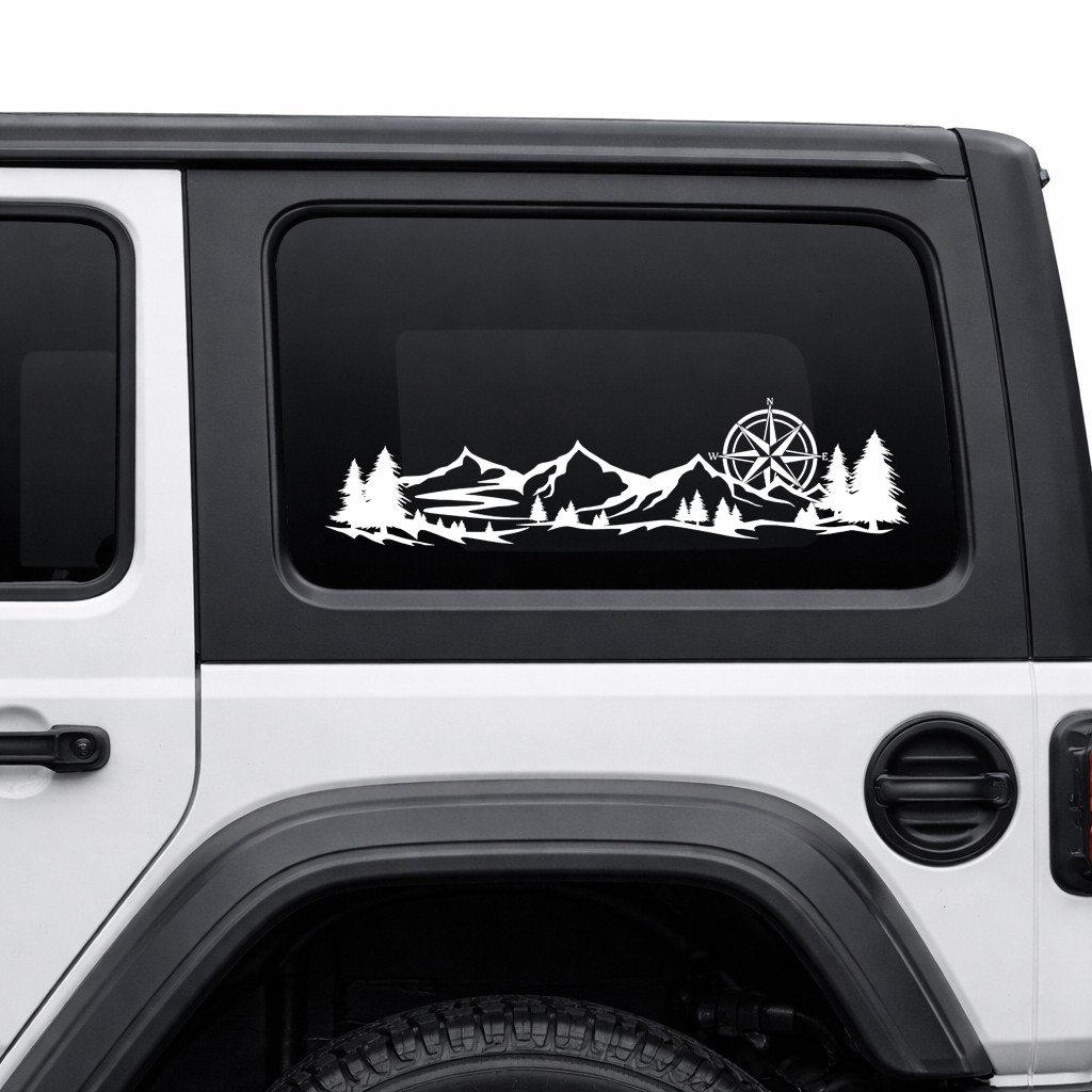 mountain compass rose vinyl sticker decal applied to rv camper rear window with outdoor wilderness adventure design