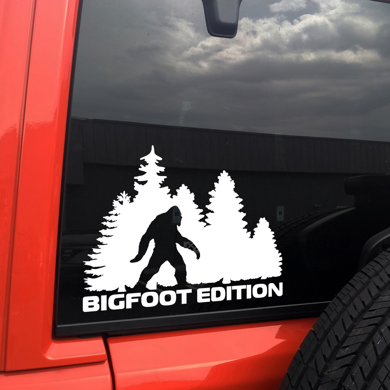 bigfoot edition forest vinyl sticker decal featuring sasquatch walking through pine trees in outdoor adventure styling