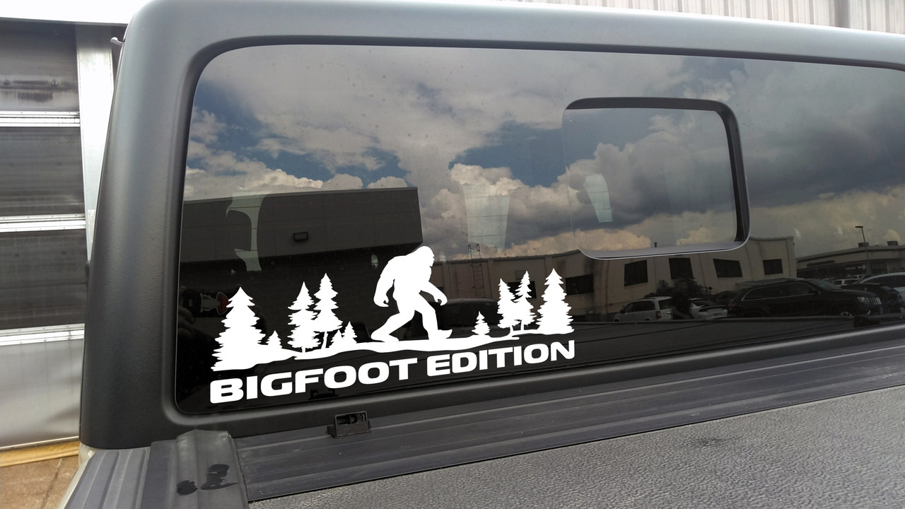 bigfoot edition forest vinyl sticker decal featuring sasquatch walking through pine trees in outdoor adventure styling