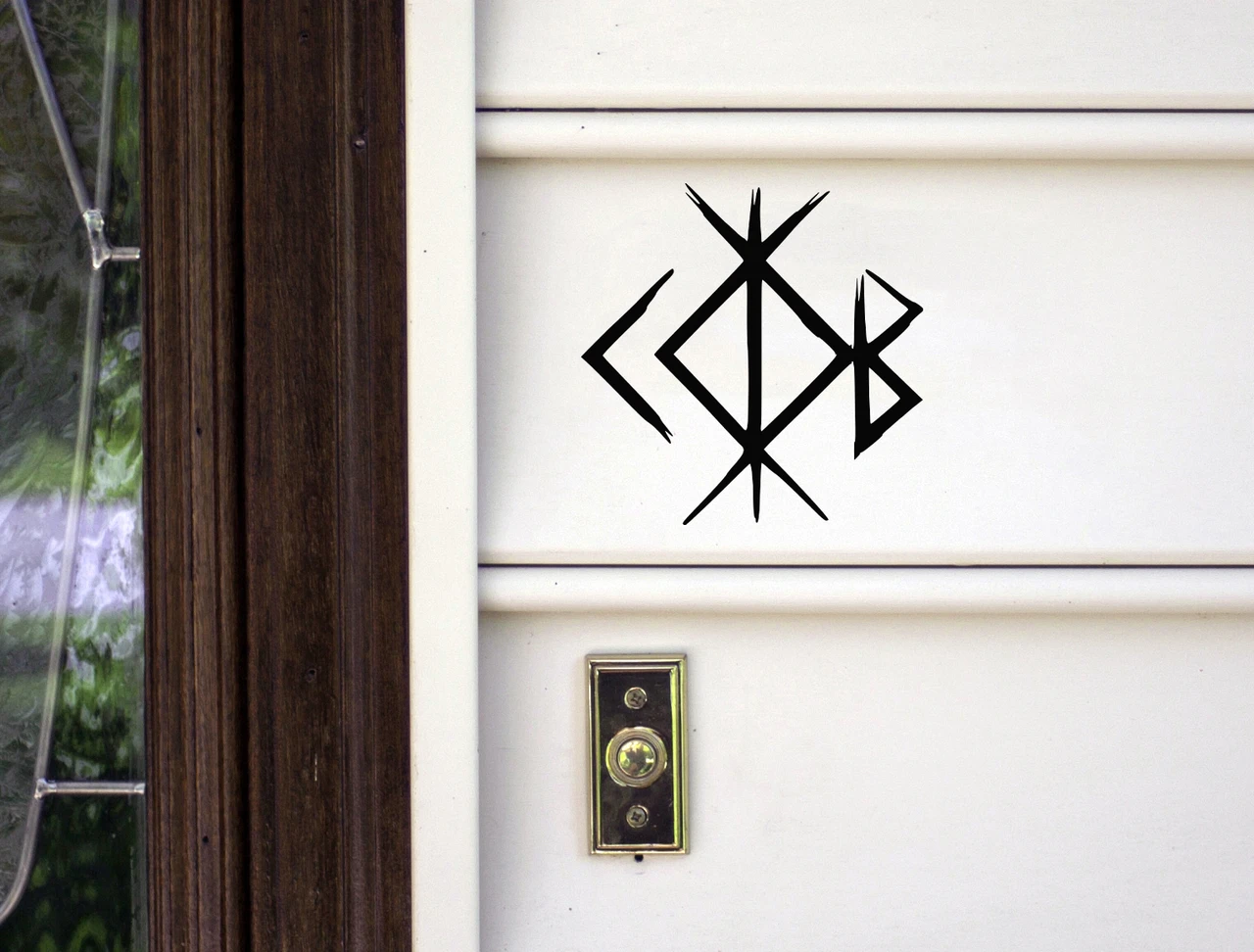 home protection bind rune vinyl decal combining algiz kenaz tiwaz and berkana runes in a norse inspired viking symbol representing protection family guidance strength and home