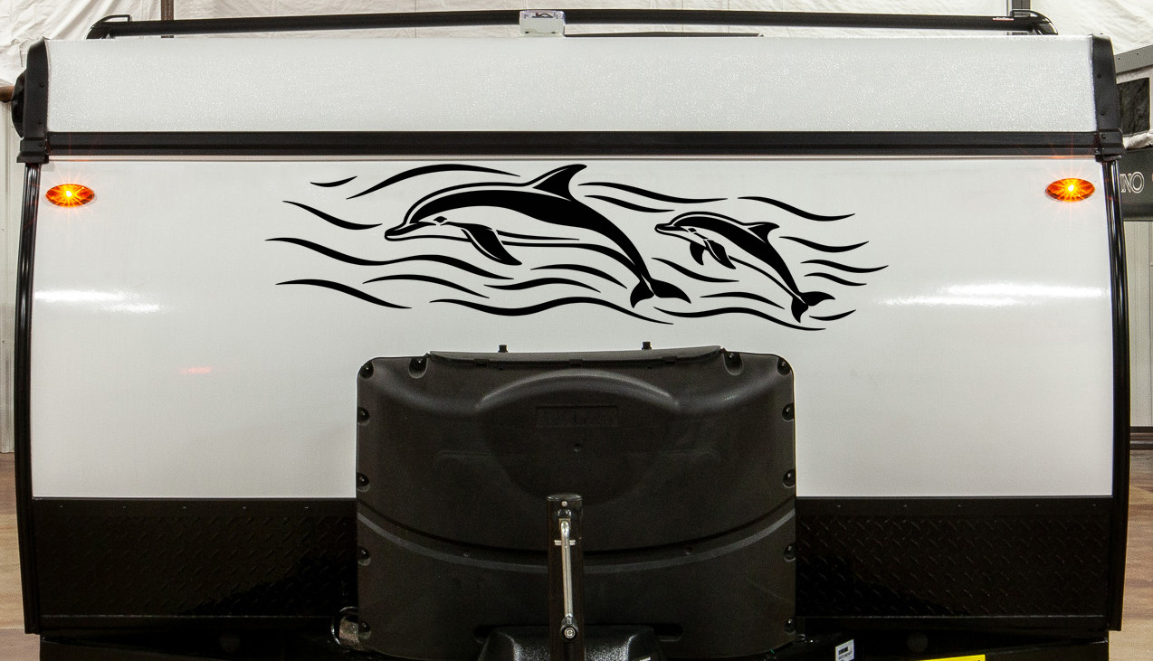 Dolphins swimming through ocean waves vinyl decal for RV camper motorhome travel trailer truck and coastal vehicle graphics