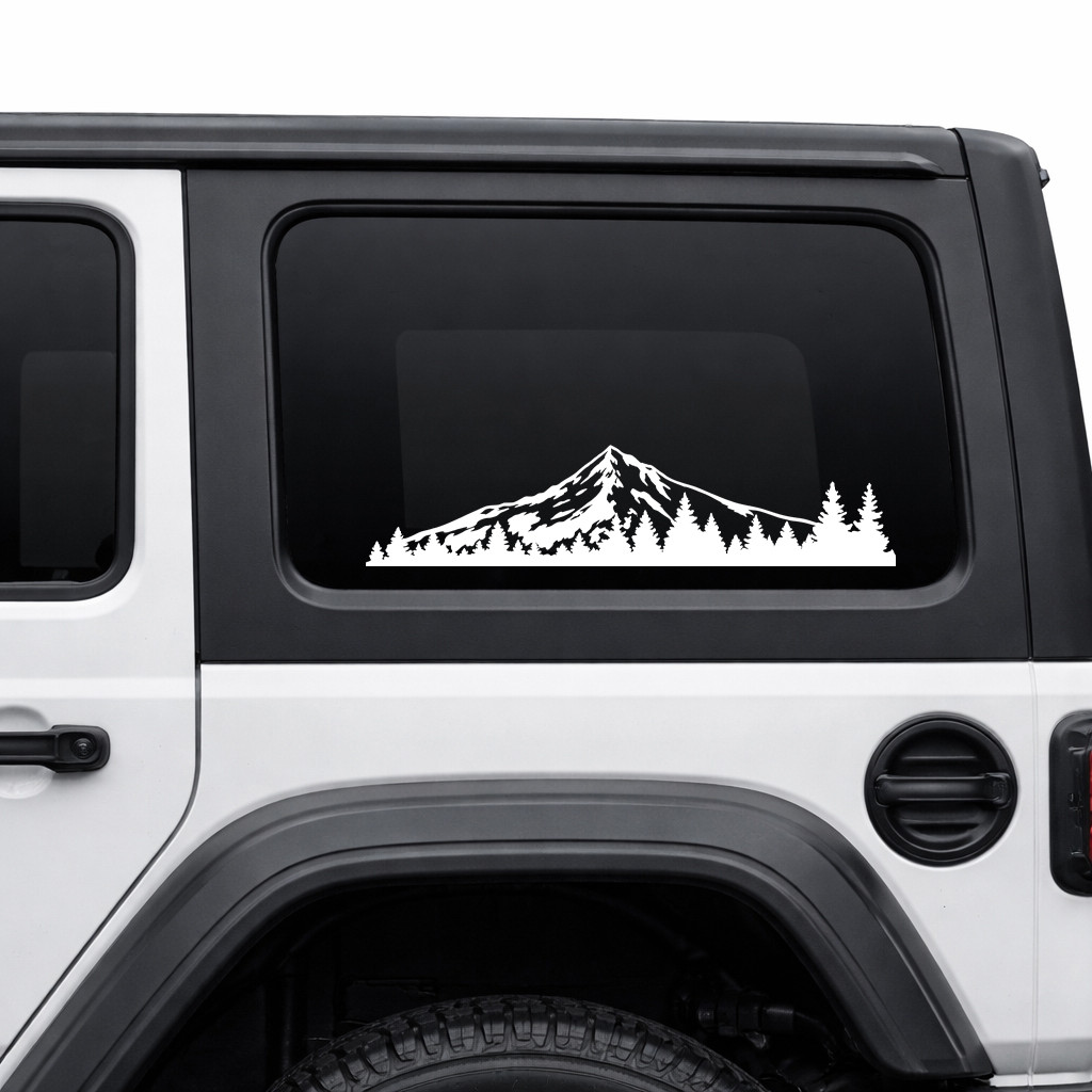 Mount Hood vinyl decal featuring the Oregon mountain above an evergreen pine forest displayed on the rear of an RV camper