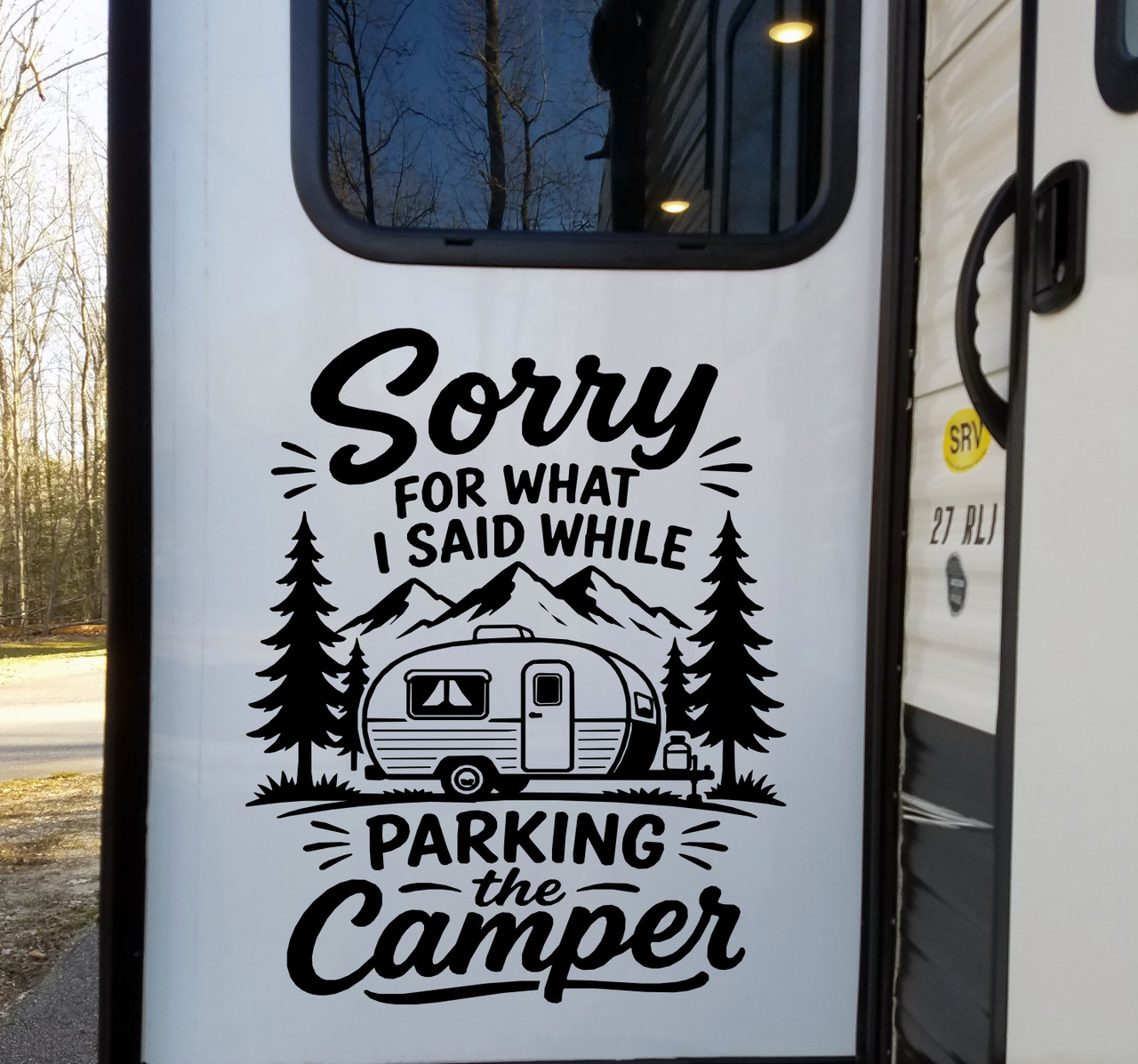 Sorry For What I Said While Parking the Camper vinyl decal featuring a travel trailer, mountains and pine trees on a camper exterior