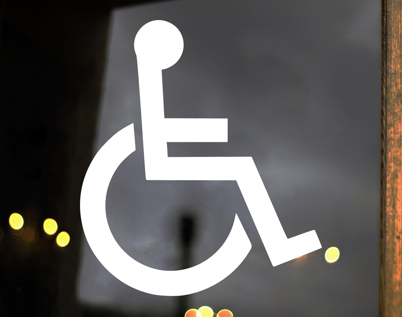 Handicap wheelchair accessibility symbol vinyl decal for doors windows vehicles and signs