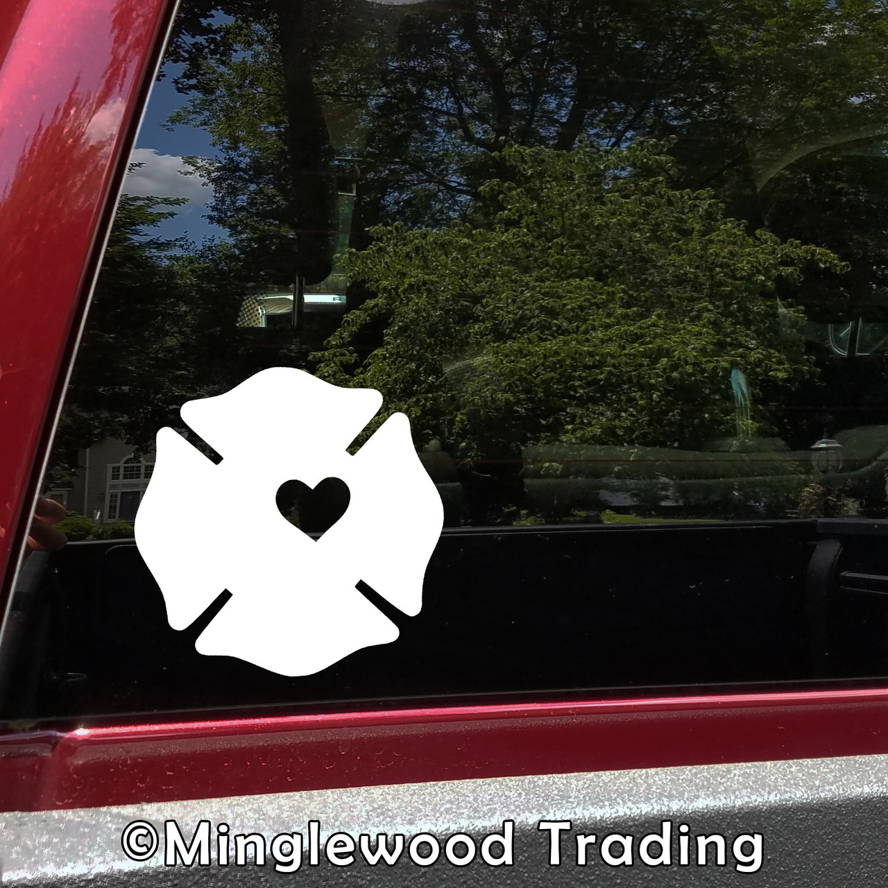 Firefighter cross heart vinyl decal with centered heart cutout for firefighters spouses families and fire rescue supporters