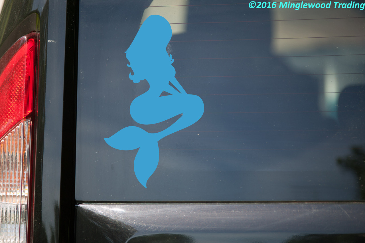 Mermaid silhouette vinyl decal with flowing hair and curved tail shown in white on a vehicle window, available in nine sizes from a 4-pack of 1 x 1.75 inches to 20 x 34.5 inches with standard or mirrored orientation