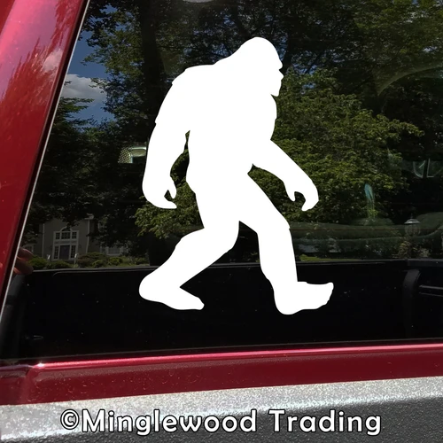 Walking Bigfoot Sasquatch silhouette vinyl decal featuring a shaggy cryptid with long arms and large feet on a vehicle window