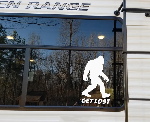 Bigfoot Get Lost vinyl decal featuring walking Sasquatch silhouette above bold GET LOST lettering for RV camper truck and vehicle windows