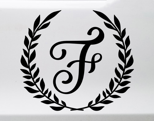 Personalized monogram vinyl decal featuring a custom initial letter surrounded by a classic laurel wreath