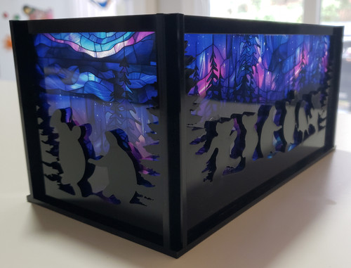 Moondance luminary SVG with dancing bears and turtles in a circular laser cut lantern design