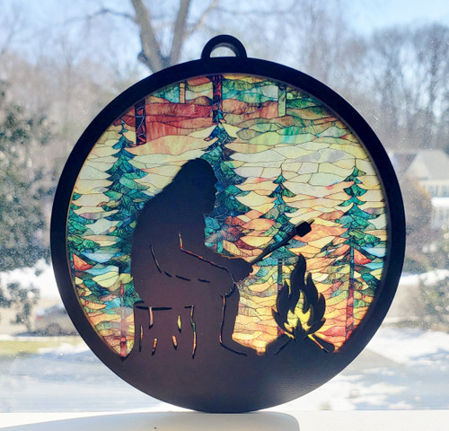 Bigfoot campfire round MDF suncatcher with pine tree forest and jute hanger cord
