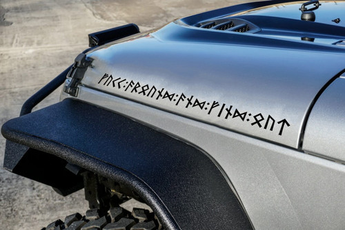 FAFO written out in Futhark runes vinyl sticker decal applied to Jeep truck hood side with bold angular rune lettering