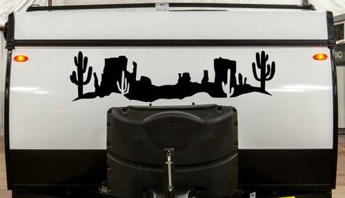Desert cactus mesa scene vinyl sticker decal applied to RV travel trailer window with southwest landscape design