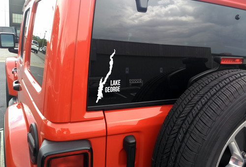 Lake George outline vinyl sticker decal applied to car window showing Adirondack New York map shape with integrated text design