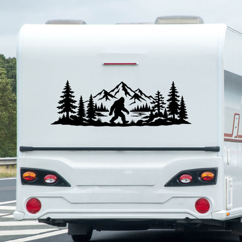 bigfoot sasquatch mountain forest vinyl sticker decal applied to rv window showing wilderness silhouette with trees and peaks