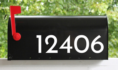 Josefin Sans vinyl mailbox numbers applied to modern residential mailbox with retro mid century typography