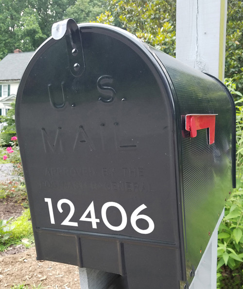 Josefin Sans vinyl mailbox numbers applied to modern residential mailbox with retro mid century typography