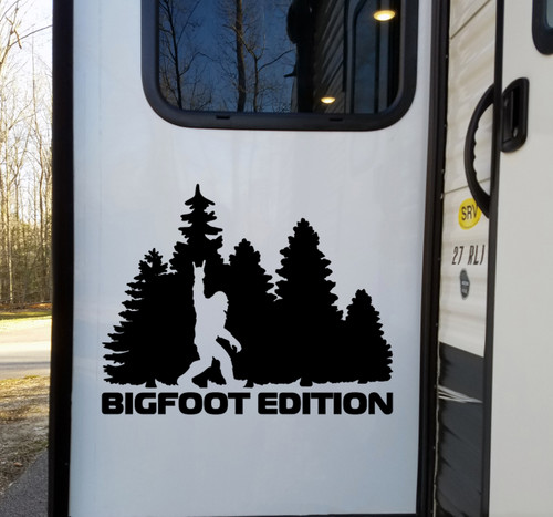 bigfoot edition forest vinyl sticker decal featuring sasquatch throwing metal horns while walking through pine trees