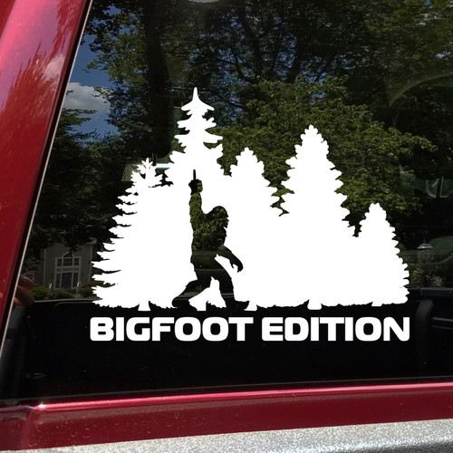 bigfoot edition forest vinyl sticker decal featuring sasquatch walking through pine trees with humorous rebellious gesture
