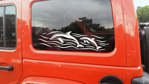 Dolphins swimming through ocean waves vinyl decal for RV camper motorhome travel trailer truck and coastal vehicle graphics