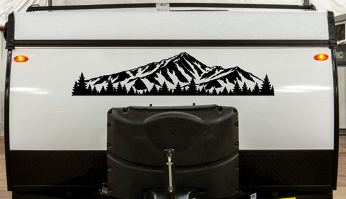 Mount Elbert Colorado Rocky Mountains panoramic vinyl decal with rugged mountain peaks and evergreen pine forest silhouette displayed on a travel trailer camper