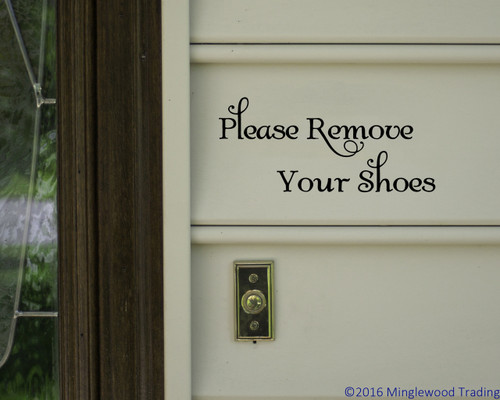 Please Remove Your Shoes vinyl decal featuring elegant decorative lettering with flourished accents for an entryway or door