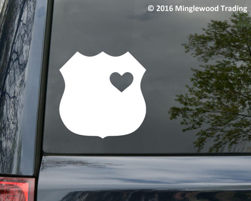 Police badge vinyl decal featuring a solid law enforcement shield silhouette with heart-shaped cutout