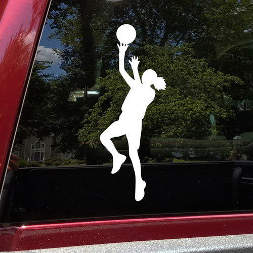 girls basketball player vinyl decal featuring a female athlete jumping and shooting a basketball, available in six sizes from a 2-pack of 1.5 x 4 inch decals to a single 7 x 18.5 inch decal with mirror option