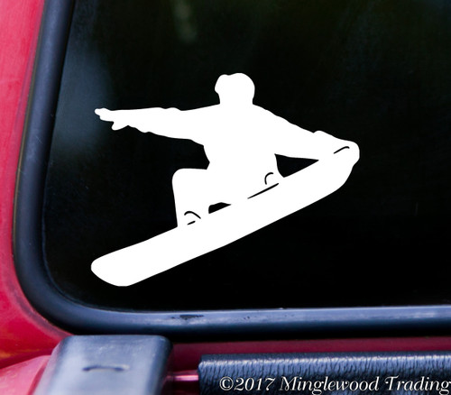 Snowboarder silhouette vinyl decal featuring a rider performing an aerial trick on a snowboard