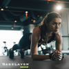 Woman doing a plank on the BaseLayer core gym flooring
