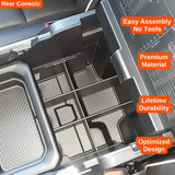 Installed Vehicle OCD Organizers by BaseLayer for RAM 1500/2500/3500 2019-2026 Lower Center Console Organizer design features graphic rear console