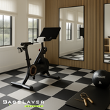 Exercise room with exercise bike on the BaseLayer Balance checkered active tiles