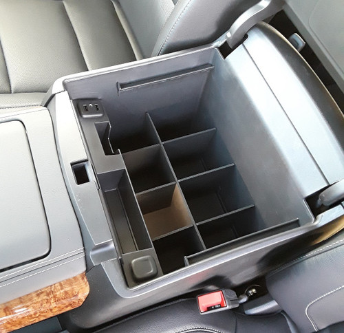 Installed view of the BaseLayer center console organizer that fits the Chevrolet Suburban and Tahoe or GMC Yukon and Yukon XL.