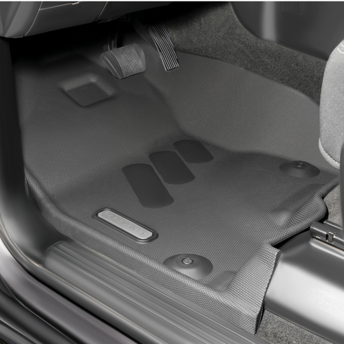 RAM DT 1500 front crew cab floor liners installed with gray logo