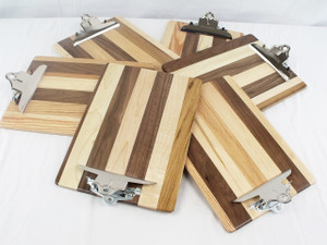 A group of six clipboards in a circle showing the different variations between the boards.
