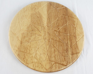 Top view of the birdseye maple lazy susan with the square rose design.