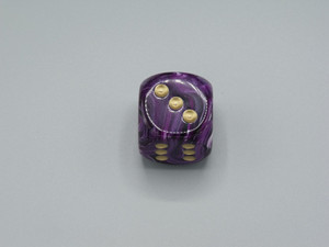 One 30mm Vortex Purple die with gold pips.