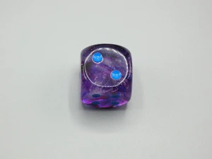 One 30mm Nebula Nocturnal with Blue Pips die.