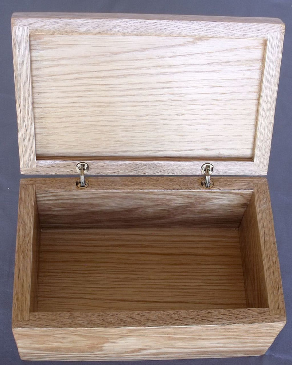 The open box showing the barrel hinges.