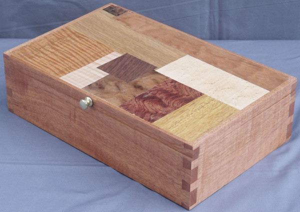 The side, front, and top of the valet box.