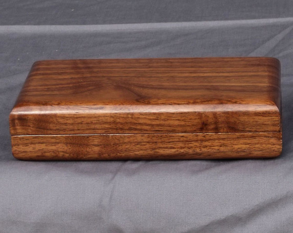 The walnut clamshell keepsake box closed.
