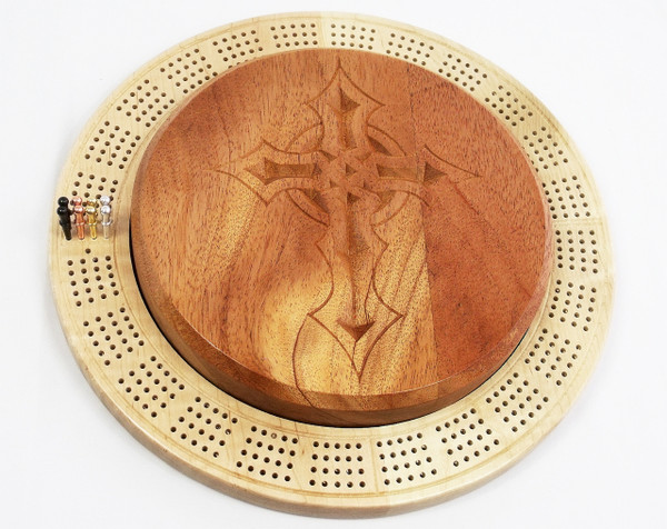 The 4-Player cribbage board made from mahogany and curly maple with a gothic cross carved into the center piece and 4 different color pegs: black, copper, steel, and brass.