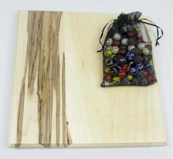 The back of the Sudoku board with the bag of marbles.