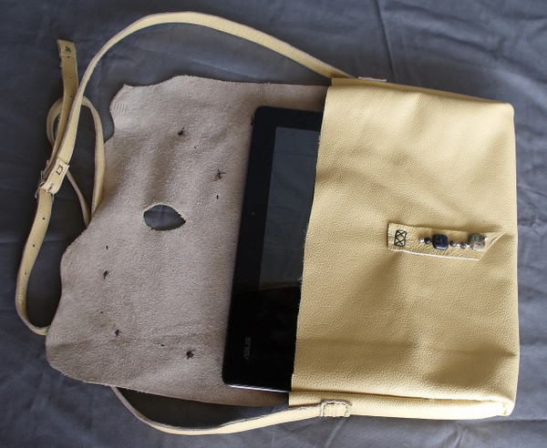 The open purse with a 10-inch tablet.