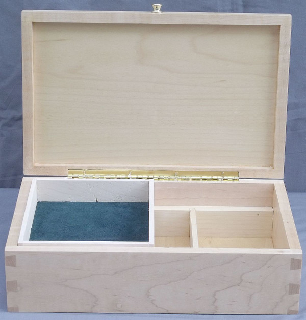 Open valet box showing the green suede-lined top tray sliding to reveal three deep bottom slots.