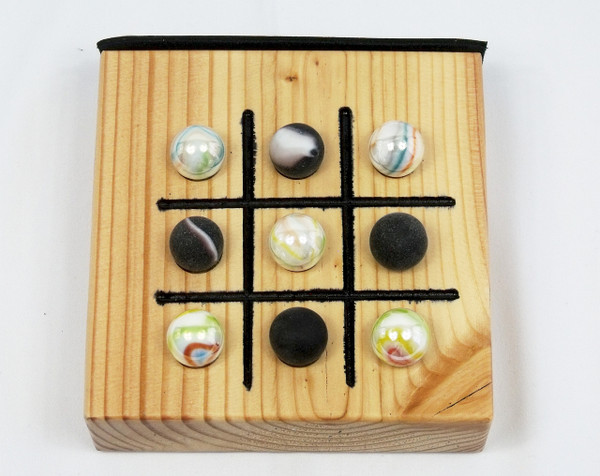 The Tic Tac Toe game with the marbles.